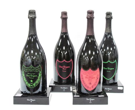 Dom Perignon Display Bottles, on branded light-up bases, two rose examples untested (empty bottles). (4)