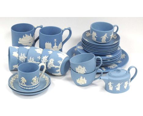 Pale Blue Wedgwood Jasperware Tea Ware, comprising tea cups and saucers (two 'Merry Christmas'), a miniature teapot applied w