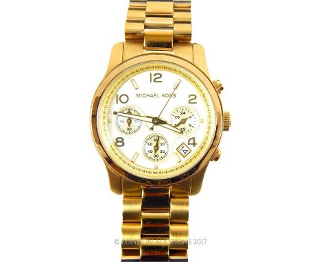 A boxed, ladies, Michael Kors, gold-toned, stainless steel, chronograph wristwatch, the dial being golden-coloured steel with