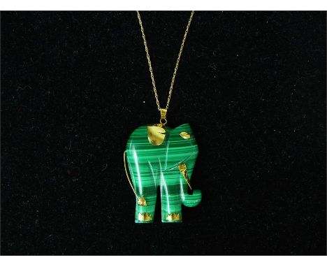 A unique, boxed, 14 ct yellow gold and carved malachite, elephant pendant suspended on a 14 ct yellow gold chain, Dimensions 