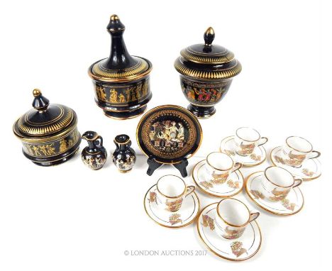 A collection of Greek ceramic items, including a set decorated with classical figures on a black ground with gilded detail, a