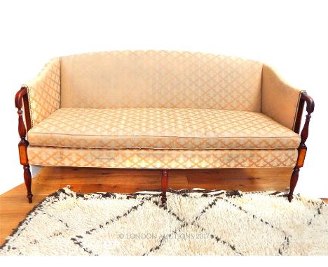 A fine, large, Edwardian, mahogany and satin wood inlaid sofa with six legs in total with three turned legs, three splayed le