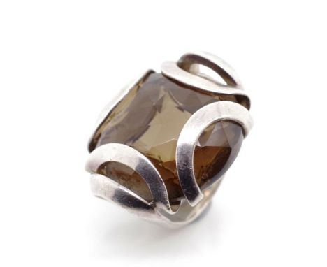 Smoky quartz and sterling silver ring marked 925 GE. Approx faceted cabochon size 24mm, ring size K