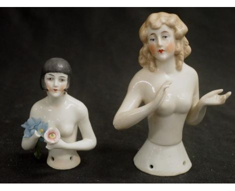 Two various ceramic half dolls including German half doll figure, (height 12cm approx); and a figure holding a blossom, (as i