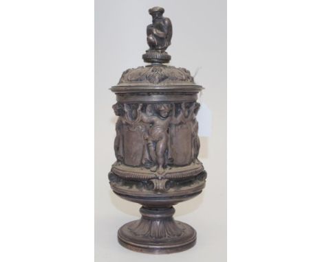 Vintage metal tobacco jar embossed classical decoration to jar, ornamental finial to lid, lined interior, (height 23cm approx
