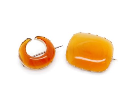 Two Victorian carnelian and gold brooches includes a carved crescent moon for resetting and a cushion cabochon pieces approx 