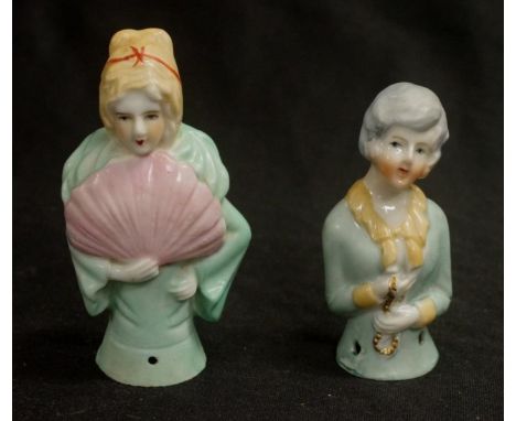 Two various ceramic half dolls including with green jacket, marked Japan, (height 9cm approx); together with a figure with a 