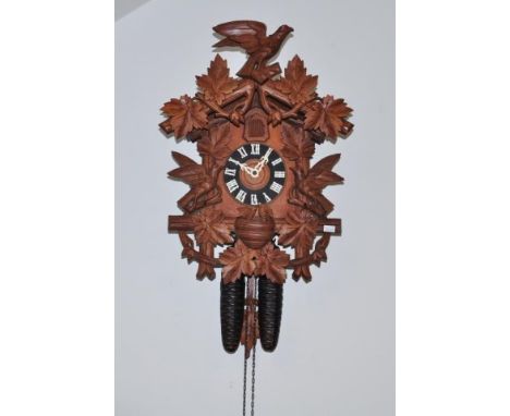 German cuckoo clock with weights &amp; pendulum, 48cm high approx.
