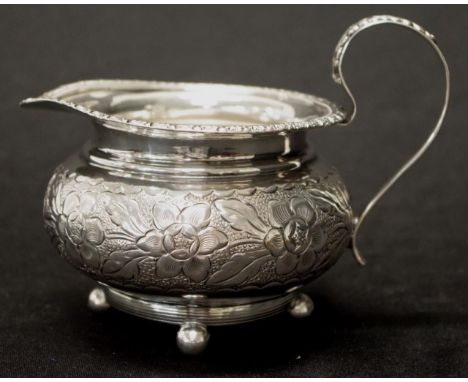 Vintage silver plate cream jug embossed floral decoration, (eight 11cm approx).