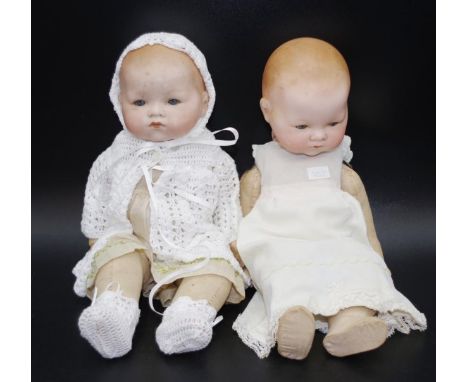 Two antique German bisque dolls including AM (Armand Marseille), 32cm high (tallest) approx.