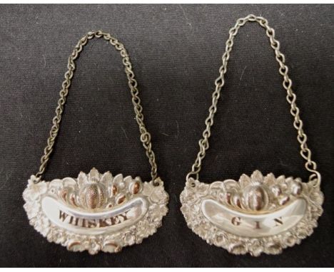 Pair Sheffield Plate spirit labels marked for 'Whiskey,' and 'Gin.'