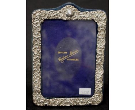 Vintage Canadian Sterling silver photo frame embossed decoration, velvet strut  verso, (height 17cm approx).