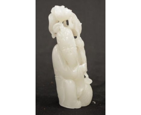 Good Chinese carved white jade figure of a man with walking staff, 11.5 cm high.