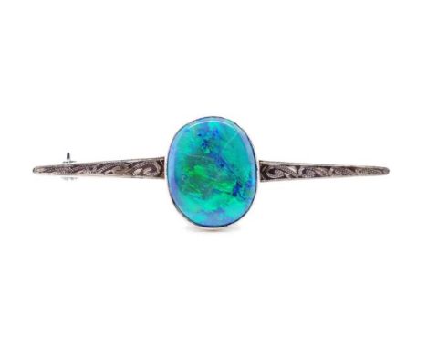 10.00ct Lightening ridge black opal bar brooch set in a white gold setting tested as 18ct. Approx 1x 10.00ct oval opal with v