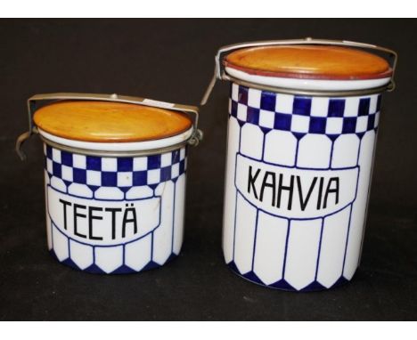 Two piece vintage Finnish ceramic canister set marked for 'Kahvia,' and 'Teeta,' (coffee and tea), each with wooden lids and 