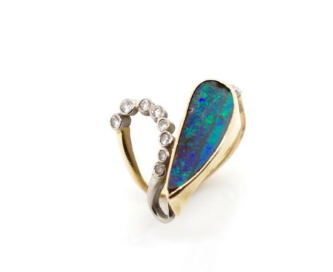 Opal and diamond set 18ct yellow gold ring by Steensons of Glenarm. Marked London 750. Approx weight 5 grams, ring size L