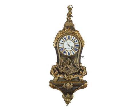 A LOUIS XV BOULLE BRACKET CLOCK, with lavish ormolu mounts, cast and chased with hunting scenes, surmounted by a figure of a 