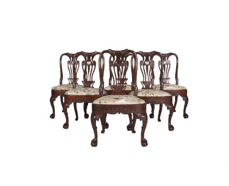 A RARE SET OF SIX GEORGE I MAHOGANY FRAME CHAIRS POSSIBLY IRISH, the slightly swept backs with curved scroll crest rails carv