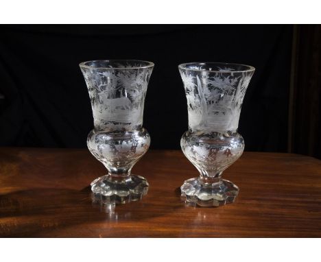 A PAIR OF 19TH CENTURY PUGH GLASS CELERY VASES IN THE MANNER OF FRANZ TIEZE, of trumpet form decorated with wheel cut continu