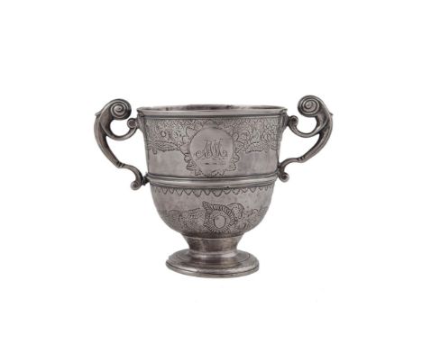 AN IRISH PROVINCIAL SILVER TWO HANDLED CUP, makers mark of John Nicholson and stamped 'STERLING' Cork c.1780, the plain ovoid