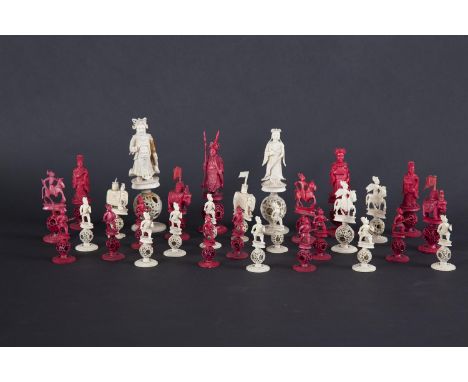 A CHINESE EXPORT CARVED IVORY CHESS SET, Canton, 19th century, with red stained and natural ivory opposition, each piece carv