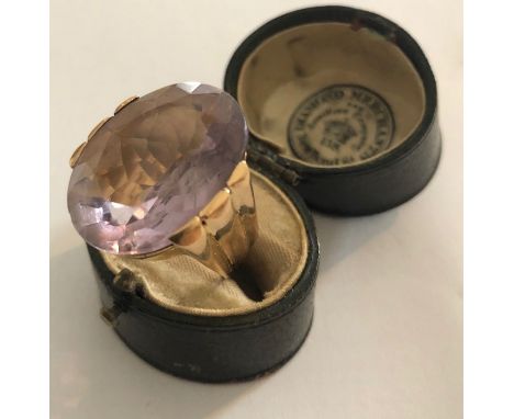 Amethyst dress ring, approximately 18.5 carat, size K/L mounted on yellow metal tested as 18 carat. 