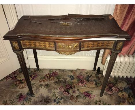 Very fine quality parquetry inlaid serpentine fronted card table with superb ormolu mounts in need of. 91 w x 73 h x 45cms d.