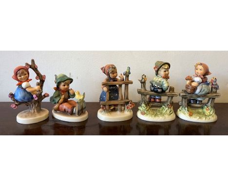 Five various Hummel figures including Apple Tree Girl, Where Are You, Singing Lesson, Pay Attention and Signs of Spring. 