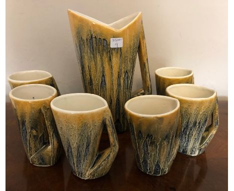 Mid Century ceramic jug and 6 cups. 