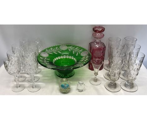 Glassware including green cut glass fruit bowl, pink cut glass decanter, lead crystal wine glasses, 2 paperweights etc. 