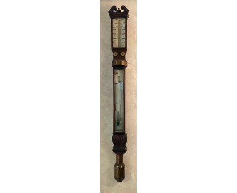 A 19thC carved mahogany ship's stick barometer by Buss and Adkins of 3 Upper East Smithfield, London, bone dial and double ve