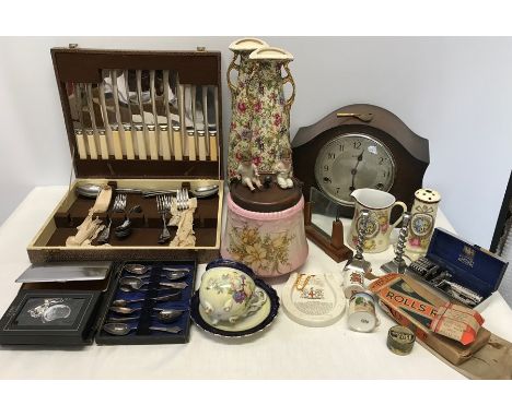 Miscellaneous lot to include oak mantle clock, cutlery, pottery vases, Goss crested ware, razors etc. 