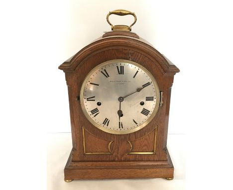 Oak bracket clock, Westminster chimes, Manoah Rhodes and Sons Ltd, Bradford. Lacking glass.