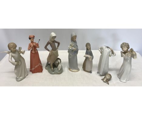 Seven ceramic figurines 3 a/f, Lladro, Nao and Capodimonte together with four Goebel Hummel figures including Singing Lesson,