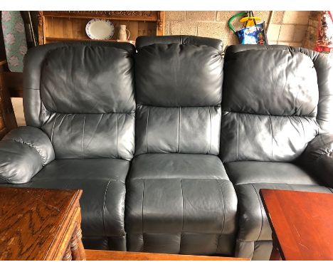 Three seater leather sofa with reclining seats.