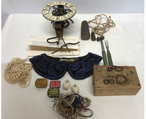 Miscellany including pearl necklaces, beaded collar, 19thC travelling knife and fork, vintage radio accessories, turret clock