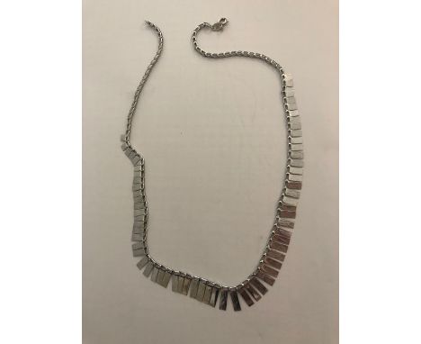 White metal necklace marked 9 K Italy. 6.1gms total.