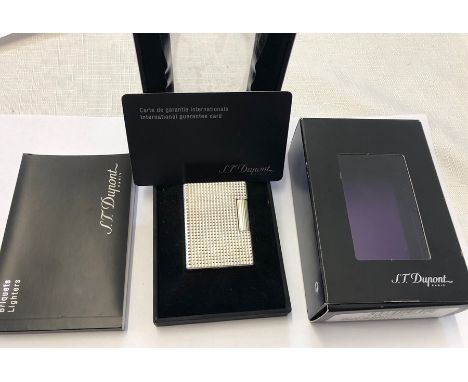 A boxed DuPont lighter. 