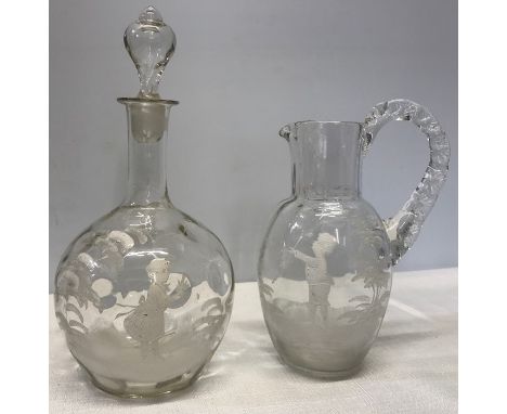 Mary Gregory clear glass jug, 19.5cms tall and a decanter, approx 24cms tall, chip to rim of the decanter.