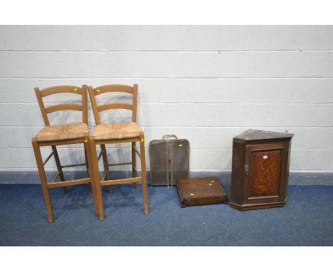 AN OAK PANELLED HANGING CORNER CUPBOARD, an oak gate leg table, an oak cutlery cabinet, brass fire screen and a pair of beech