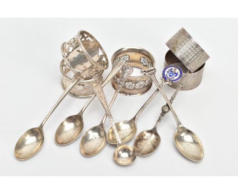 SIX SILVER NAPKIN RINGS AND A QUANTITY OF SILVER TEASPOONS, to include three pierced napkin rings and two engine turned napki