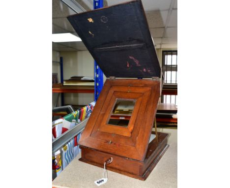 A NEGATIVE RETOUCHING DESK, with drawer containing glass inserts (sd), pencils and other instruments, hinged lower tray with 