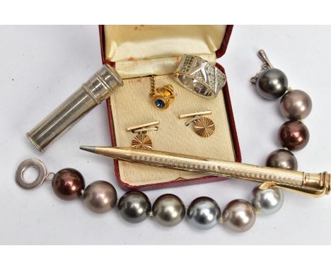 FIVE ASSORTED ITEMS, to include a 14ct rolled gold, engine turned pattern propelling pencil, a cased set of yellow tone cuffl