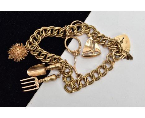 A 9CT GOLD CHARM BRACELET, double curb link bracelet fitted with five charms in forms such as a boat, wedding ring set, hedge