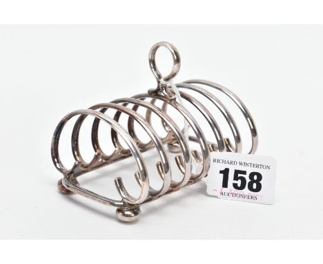 A SILVER TOAST RACK, plain polished design fitted with a circular handle, hallmarked 'C J Vander Ltd' Sheffield 1997, approxi