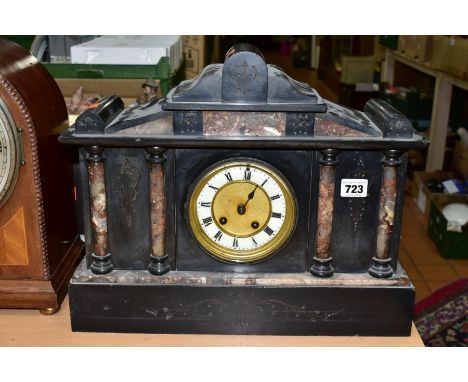 A VICTORIAN SLATE AND MARBLE MANTLE CLOCK, the chapter ring having Roman numeral hour markers, the eight day movement is unma