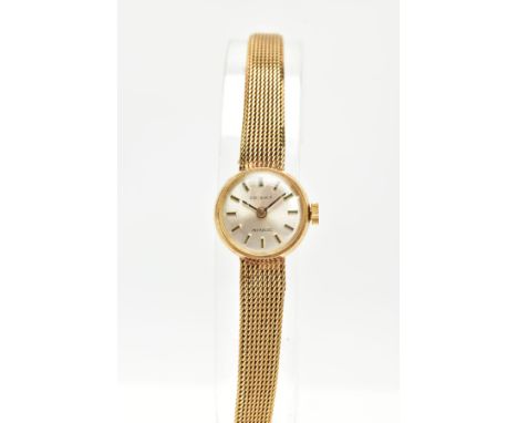 A LADIES 14CT GOLD 'PRISMA' WRISTWATCH, hand wound movement (working), round silver dial signed 'Prisma', baton markers, blac
