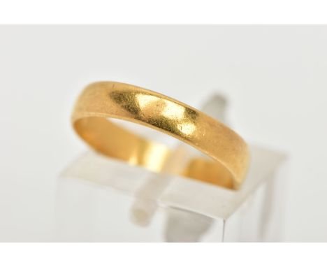A YELLOW METAL BAND RING, approximate width 4mm,  unmarked, ring size K, approximate gross weight 2.5 grams (condition report