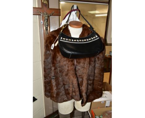 A JANE SHILTON BLACK LEATHER HANDBAG WITH DUST BAG, a brown fur cape with Browns of Chester label and a claret coloured bag, 