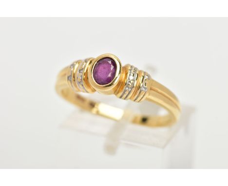 A YELLOW METAL RUBY AND DIAMOND DRESS RING, centring on a bezel set oval cut ruby, flanked with single cut diamond detailed s